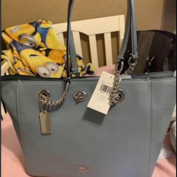 Brand new coach purse authentic and still has original tags and packaging on it. - Picture 2 of 3